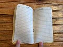(2) 1954 John Deere Farmers Pocket Ledgers