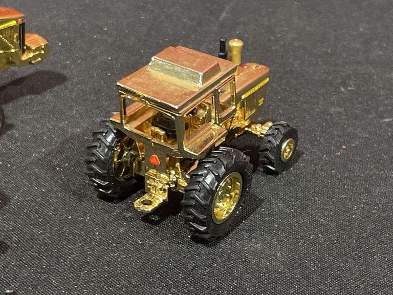 (4) 1/64 John Deere Gold Tractors Ertl