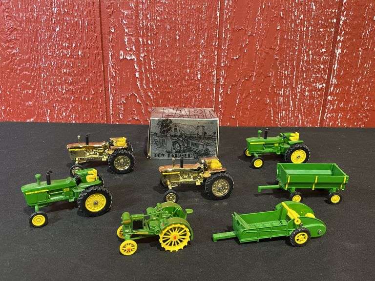 (8) 1/43 John Deere Tractors + Implements Ertl