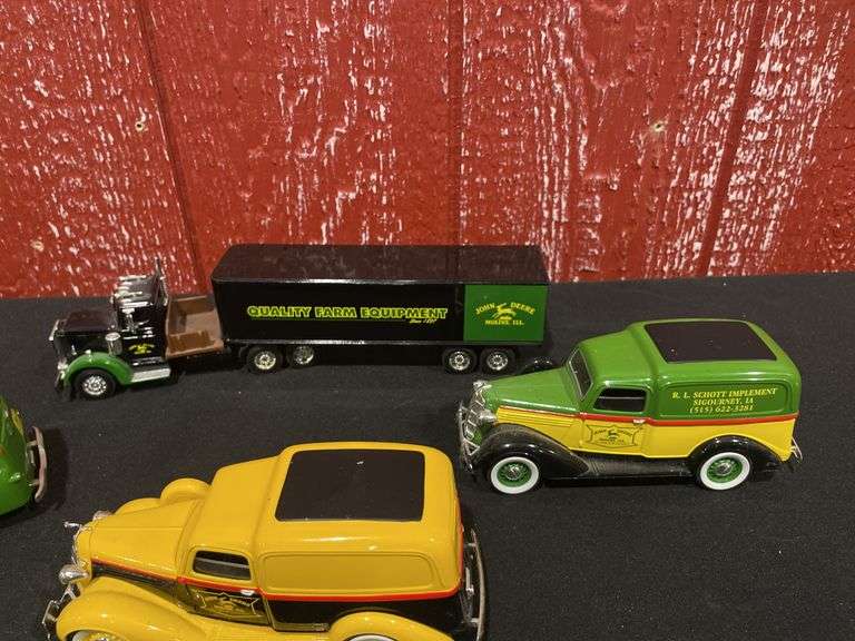 (4) John Deere Trucks