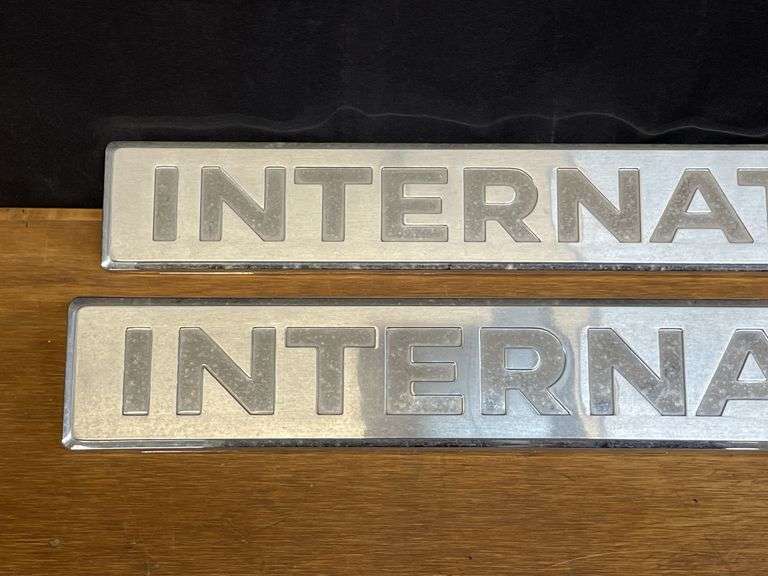 (4) International Badges