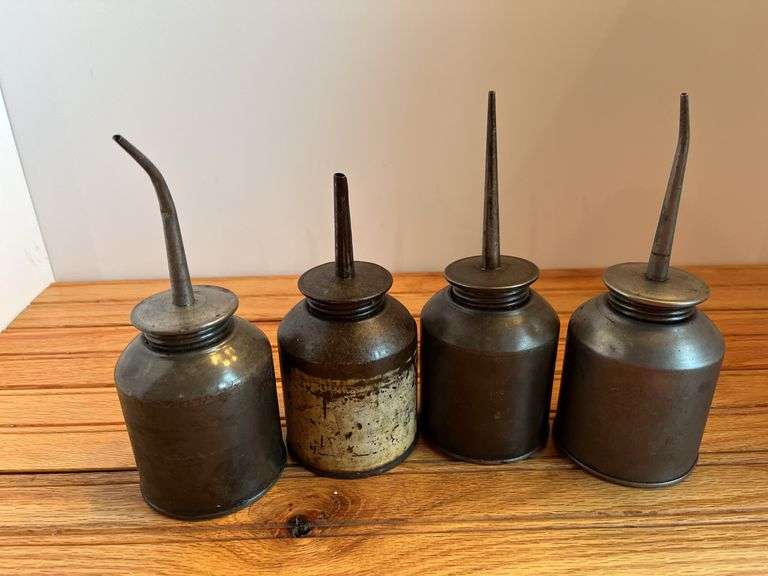 (4) Oil Cans image