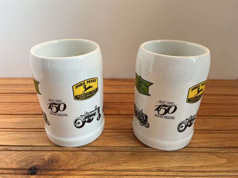 (2) 1987 John Deere 150th Steins