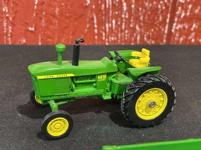 (8) 1/43 John Deere Tractors + Implements Ertl
