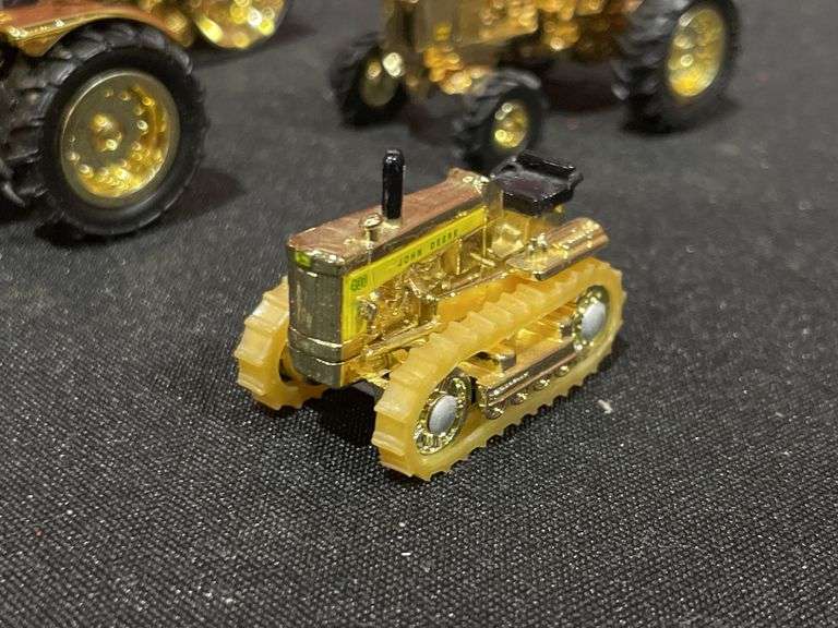 (4) 1/64 John Deere Gold Tractors Ertl