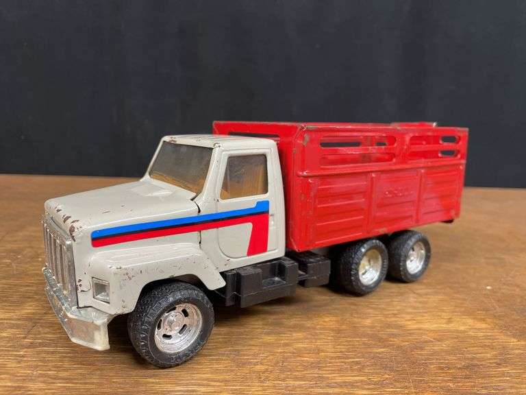 (2) Tombstone + Stake Trucks Ertl
