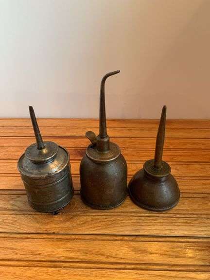 (3) Oil Cans image