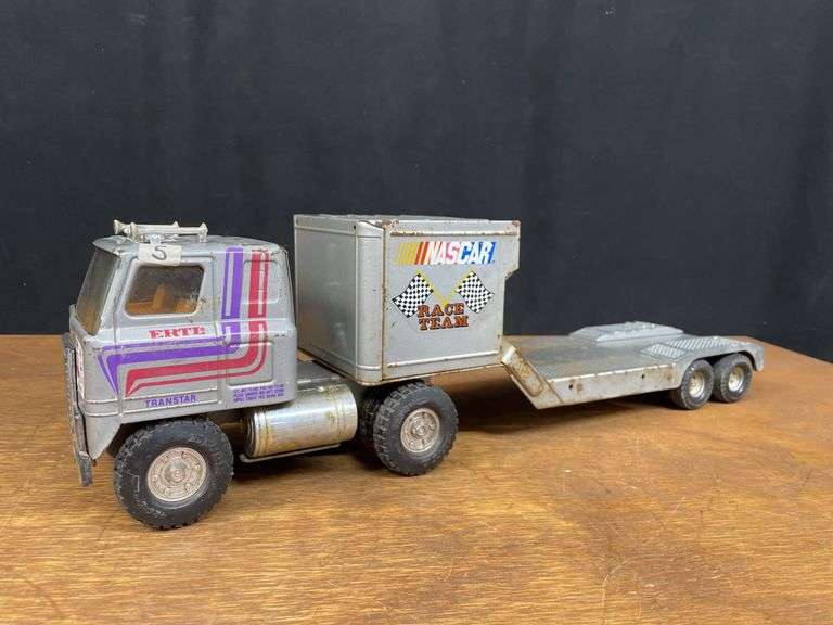 (2) IH Transtar NASCAR + Car Hauler Semis Ertl