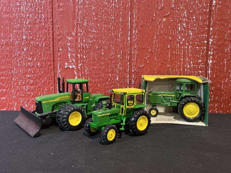 (3) 1/32 John Deere Tractors Ertl image