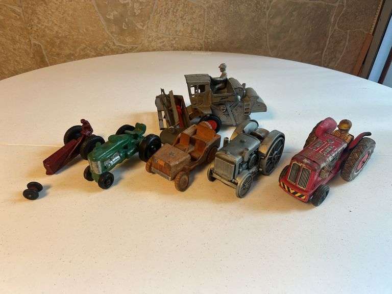 (4)Tractors, (1) Jeep, and (1) Combine image