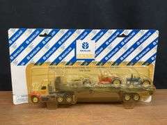 (2) 1/64 New Holland Trucks NIB Ertl
