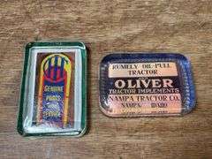(2) Oliver + IHC Glass Paperweights