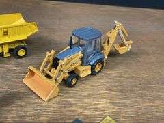 (9) 1/64 Construction Equipment