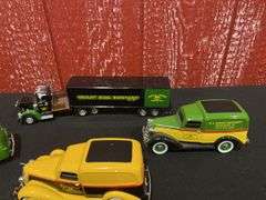 (4) John Deere Trucks
