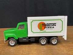 (2) Tombstone + Stake Trucks Ertl