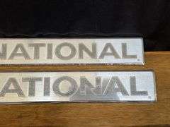(4) International Badges