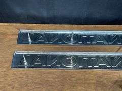 (4) International Badges