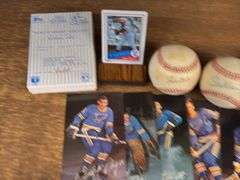 Autographed Stan Musial & Jack Buck Baseballs, Kirby Puckett Porcelain Card, & Mark Mcgwire Tin