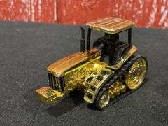 (4) 1/64 John Deere Gold Tractors Ertl