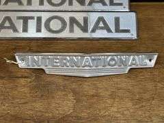 (4) International Badges