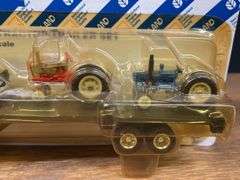 (2) 1/64 New Holland Trucks NIB Ertl