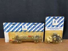 (2) 1/64 New Holland Trucks NIB Ertl