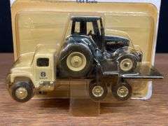 (2) 1/64 New Holland Trucks NIB Ertl