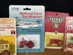 (9) 1/64 IH Tractors