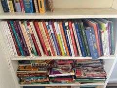 Books, Floor Lamp, and Old Guitar