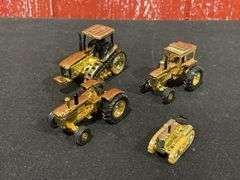 (4) 1/64 John Deere Gold Tractors Ertl