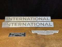 (4) International Badges