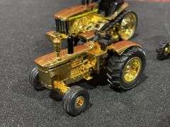 (4) 1/64 John Deere Gold Tractors Ertl