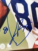 Isaac Bruce Autographed Photo on Wood Plaque