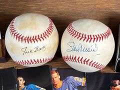 Autographed Stan Musial & Jack Buck Baseballs, Kirby Puckett Porcelain Card, & Mark Mcgwire Tin