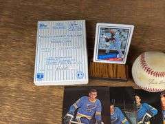 Autographed Stan Musial & Jack Buck Baseballs, Kirby Puckett Porcelain Card, & Mark Mcgwire Tin