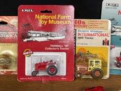 (9) 1/64 IH Tractors