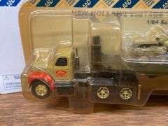(2) 1/64 New Holland Trucks NIB Ertl