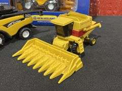 (3) 1/64 New Holland Combines