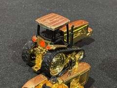 (4) 1/64 John Deere Gold Tractors Ertl