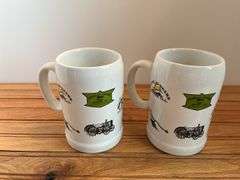 (2) 1987 John Deere 150th Steins