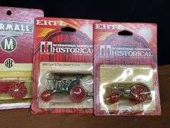 (9) 1/64 IH Tractors