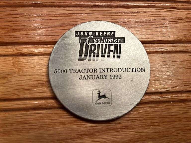 (2) John Deere Medallions