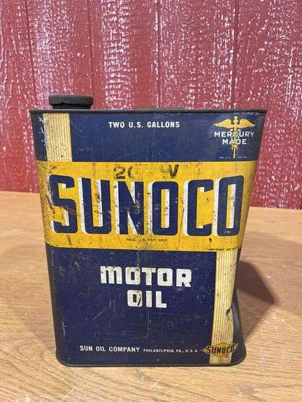 (4) vintage two-gallon motor oil cans,