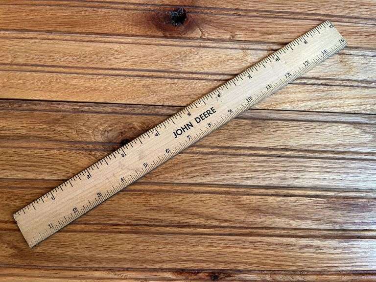 (4) John Deere Rulers