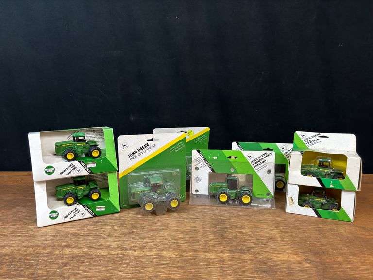 (8) 1/64 John Deere 4wd Tractors NIB Ertl image