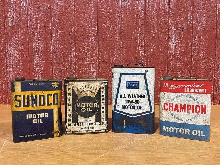 (4) vintage two-gallon motor oil cans, image