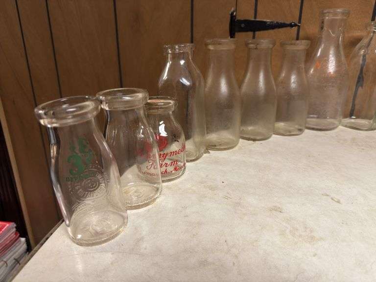 (19) Dairy Bottles and Butter Churn