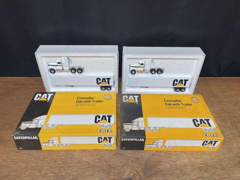 (2) 1/64 Caterpillar Semis NIB Ertl
