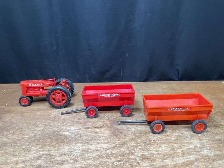 (3) 1/16 Farmall M + Wagons Product Miniature