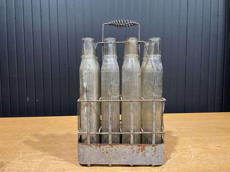 (8) Pure Oil Tiolene Embossed Glass Oil Bottles with (2) Carriers